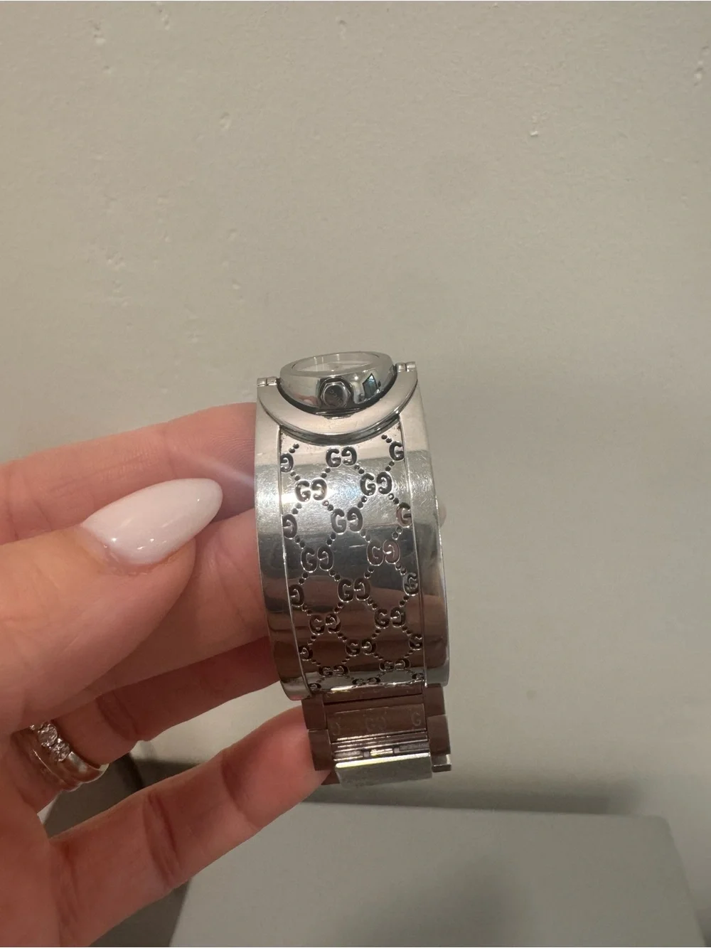 Gucci Silver-Tone GG Engraved Bangle Watch with White Dial